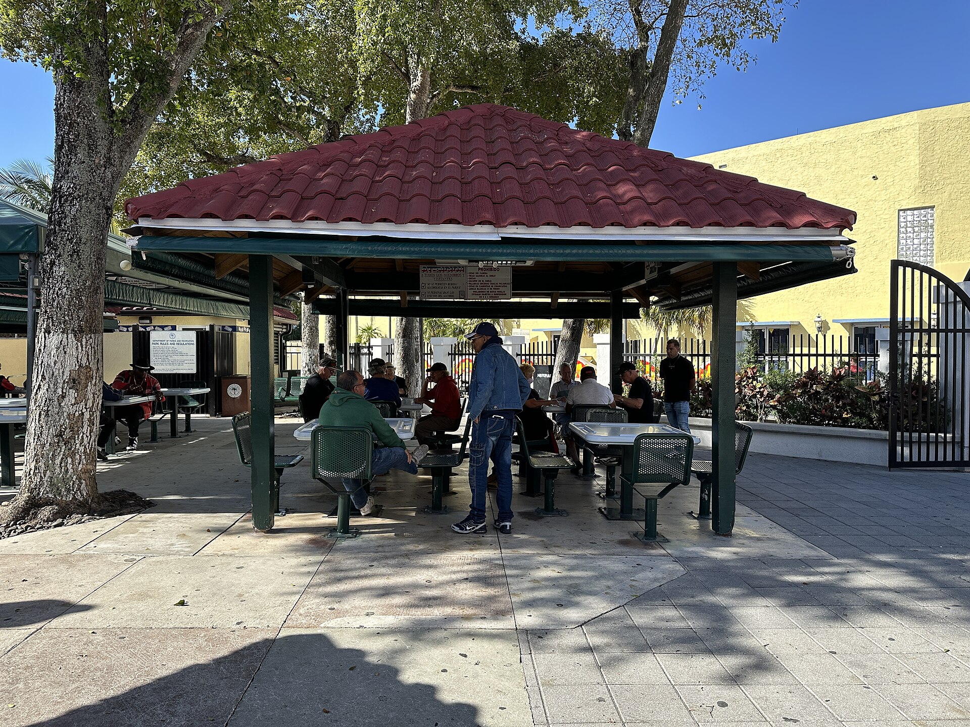 Men playing dominoes at Domino Park in Little Havana, Miami