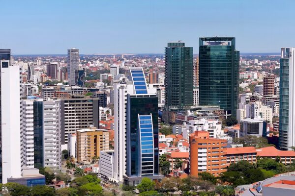 Glass and concrete high-rise towers of central Santa Cruz de la Sierra under a clear blue sky