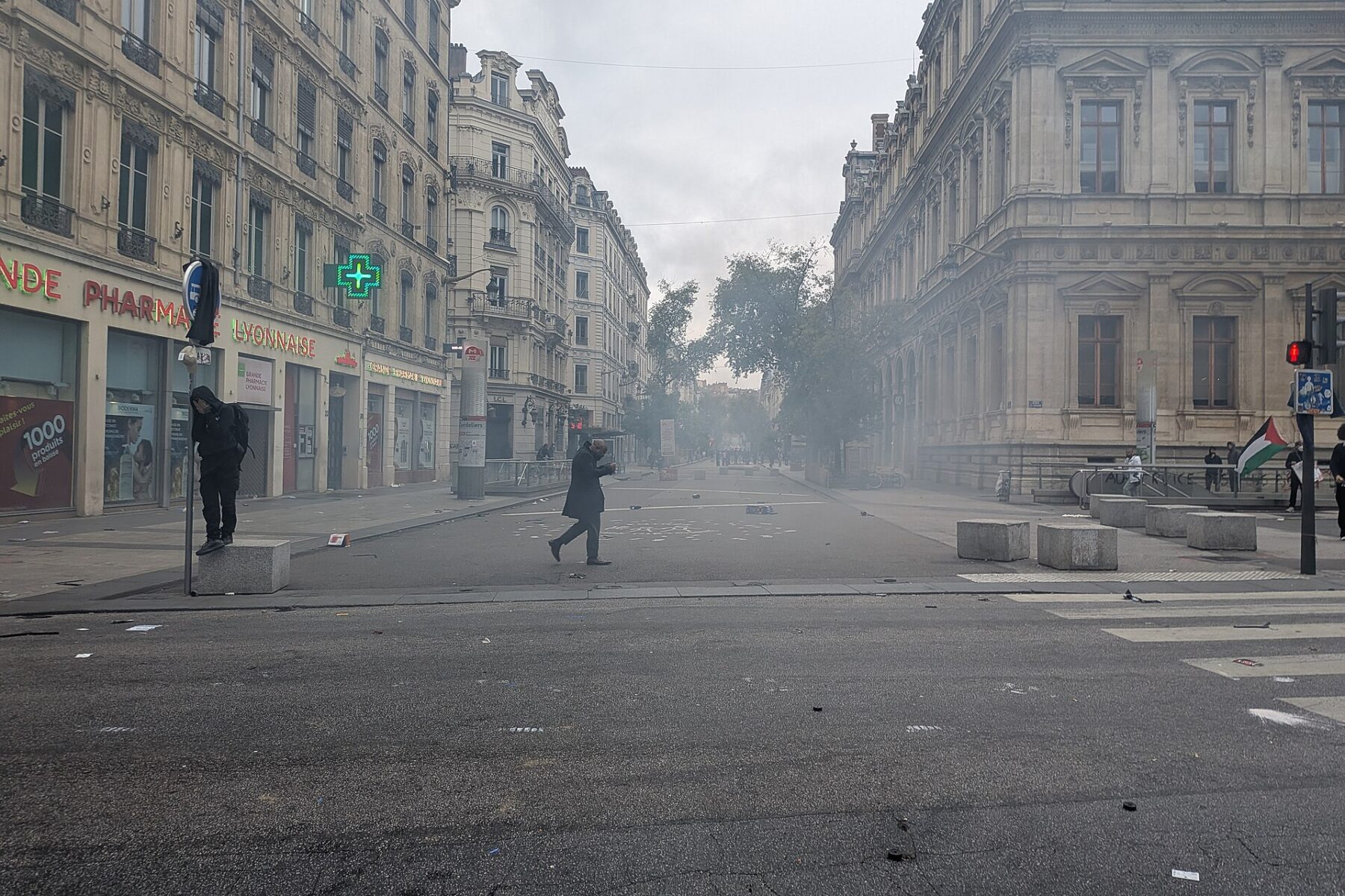 Tear gas drifting along Rue de la République in Lyon during the protests of 17 October 2026