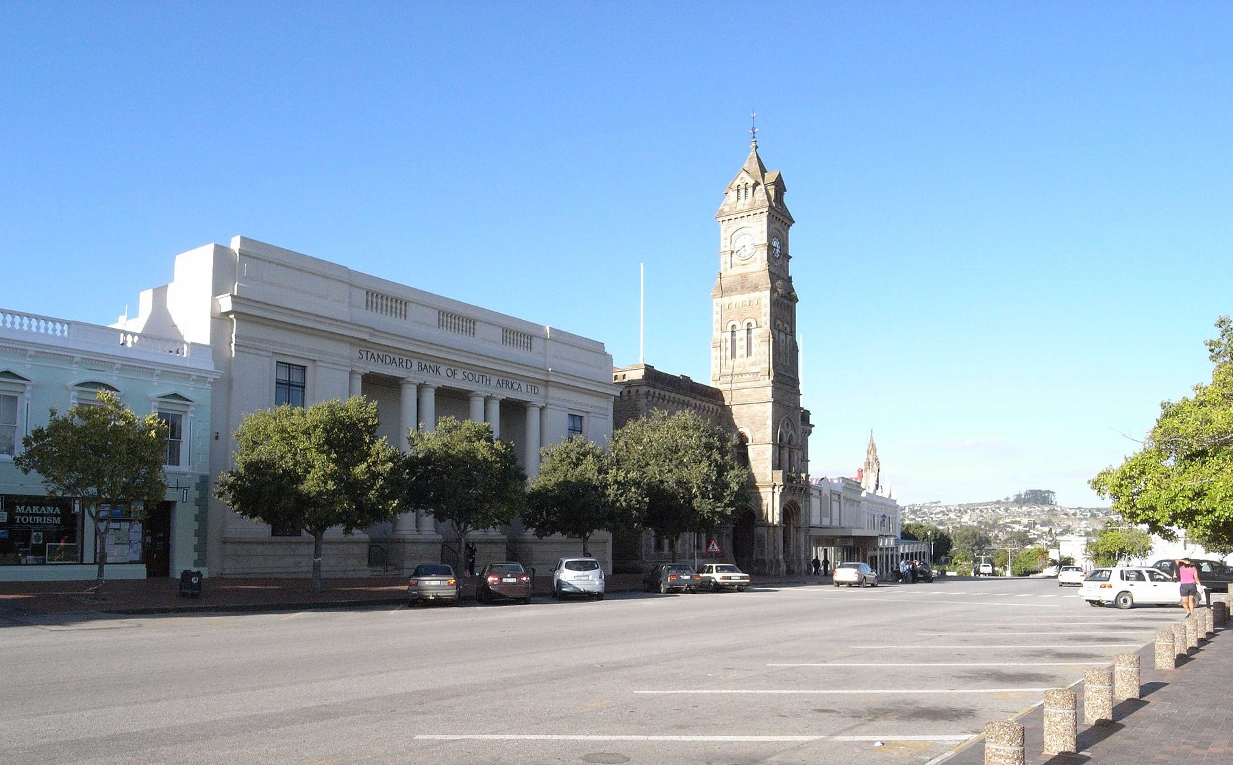 Church Square in Makhanda, South Africa, with the clock tower of the City Hall and a Standard Bank building