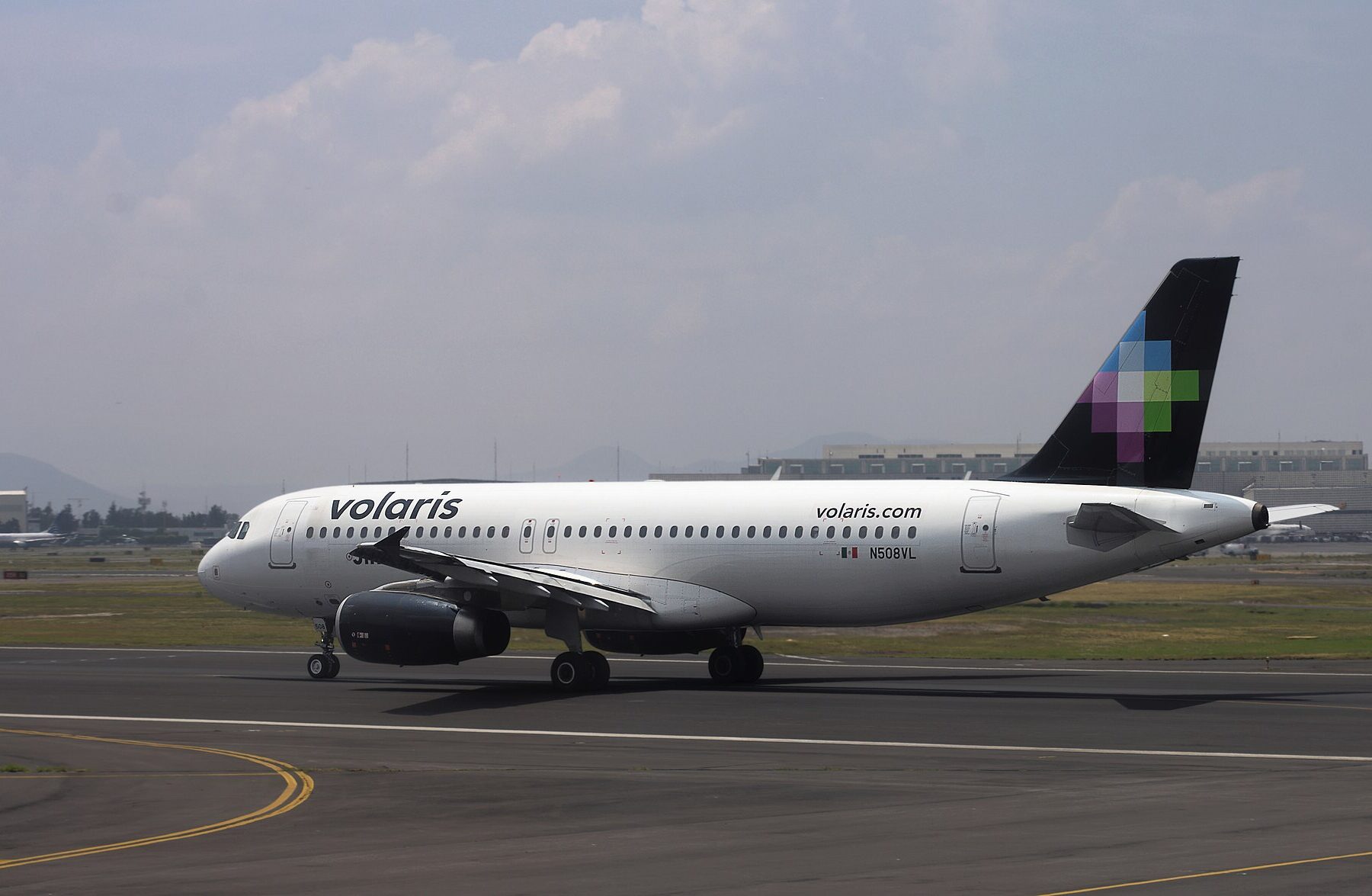 A Volaris Airbus A320 taxiing at Mexico City International Airport