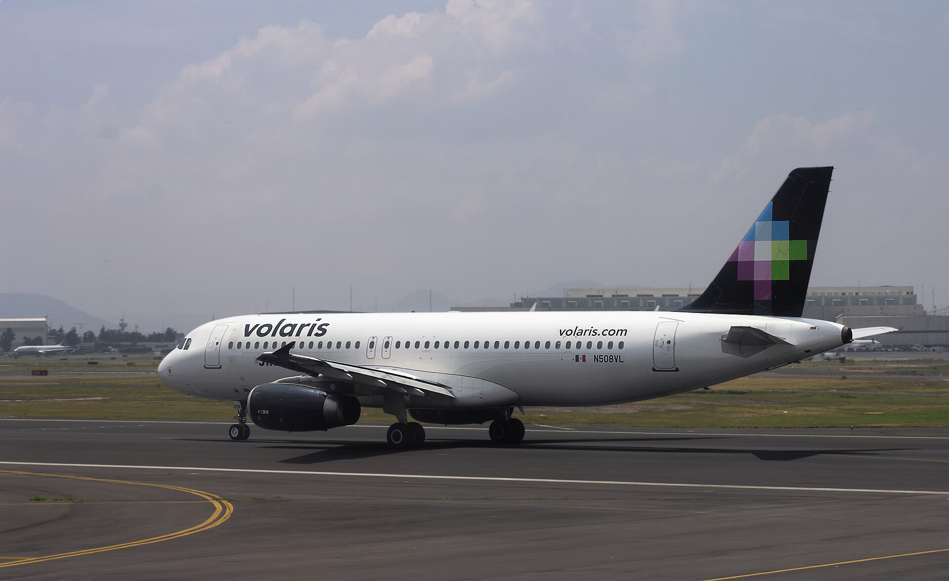 A Volaris Airbus A320 taxiing at Mexico City International Airport