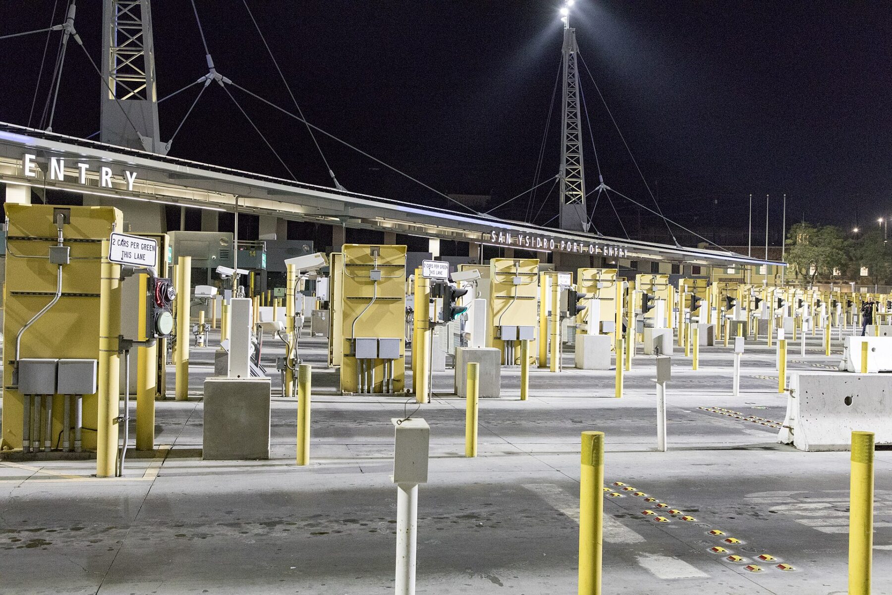 Vehicle inspection lanes at the San Ysidro Port of Entry between San Diego and Tijuana at night