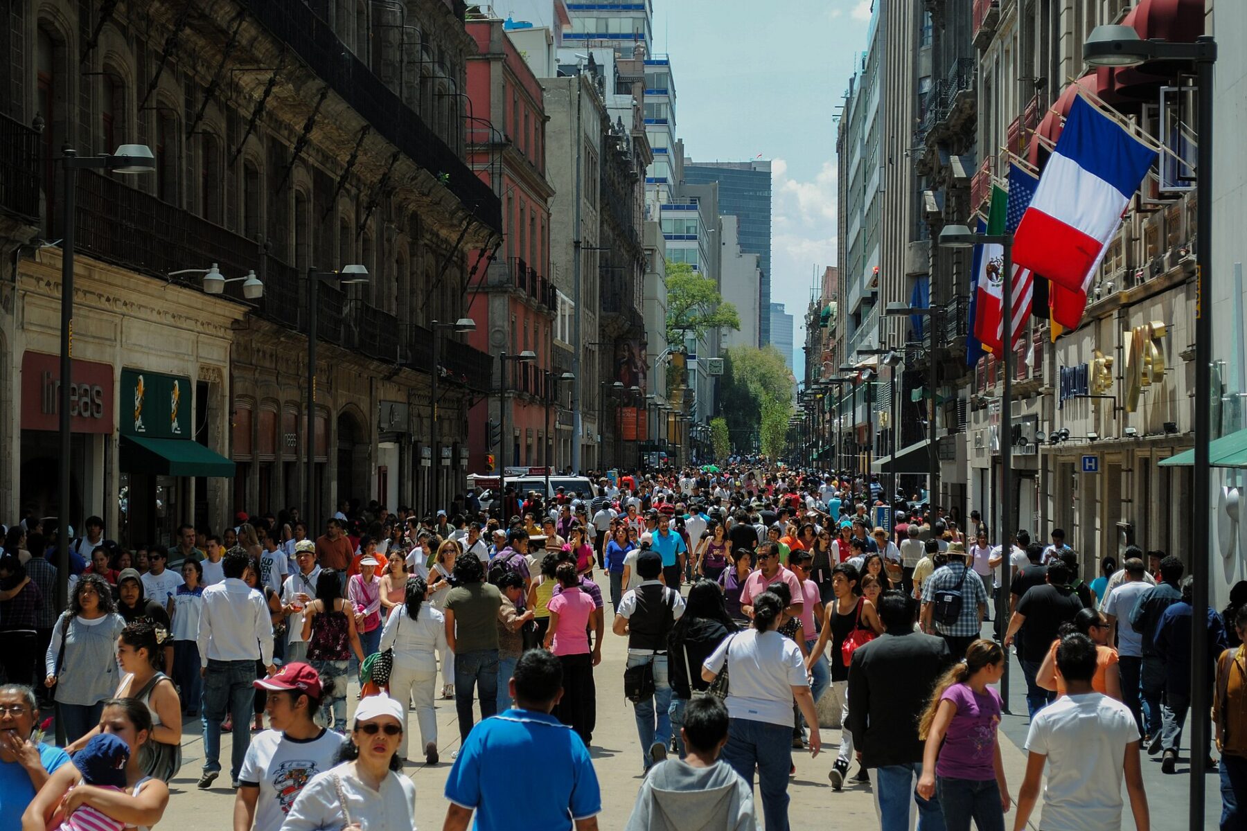Crowds of shoppers on Calle Madero, the pedestrian shopping street in Mexico City's historic centre