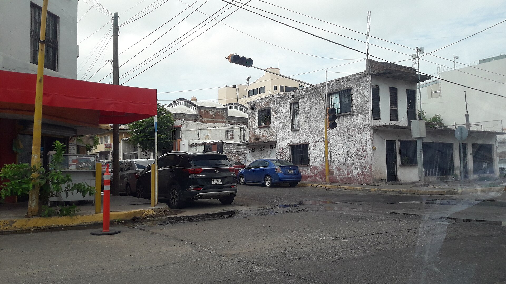 A street corner with a traffic light in Culiacan Rosales, Sinaloa, Mexico