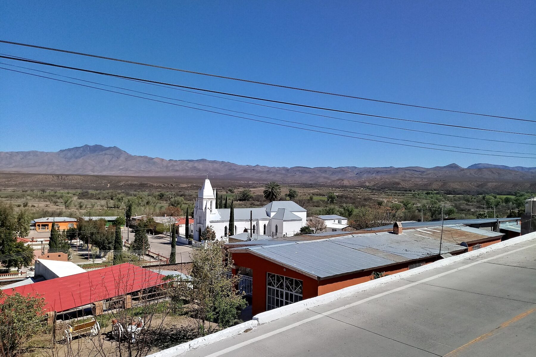 The town of Bavispe in northeastern Sonora, Mexico, with mountains of the Sierra Madre behind it