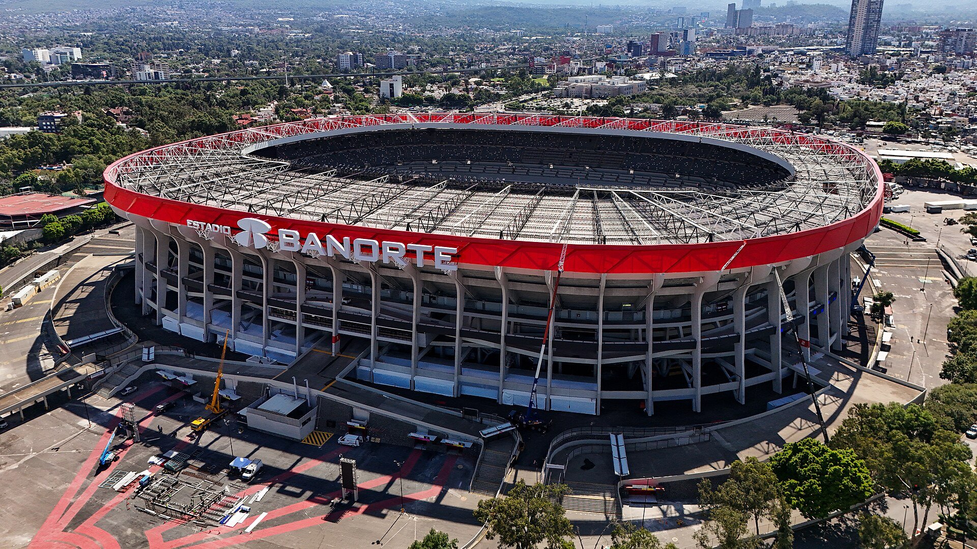 Aerial drone view of Estadio Banorte, the Azteca stadium in Mexico City, with its red roof ring after the 2026 renovation