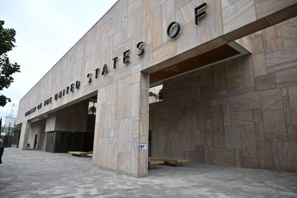 Front of the US Embassy building in Mexico City with raised lettering reading Embassy of the United States