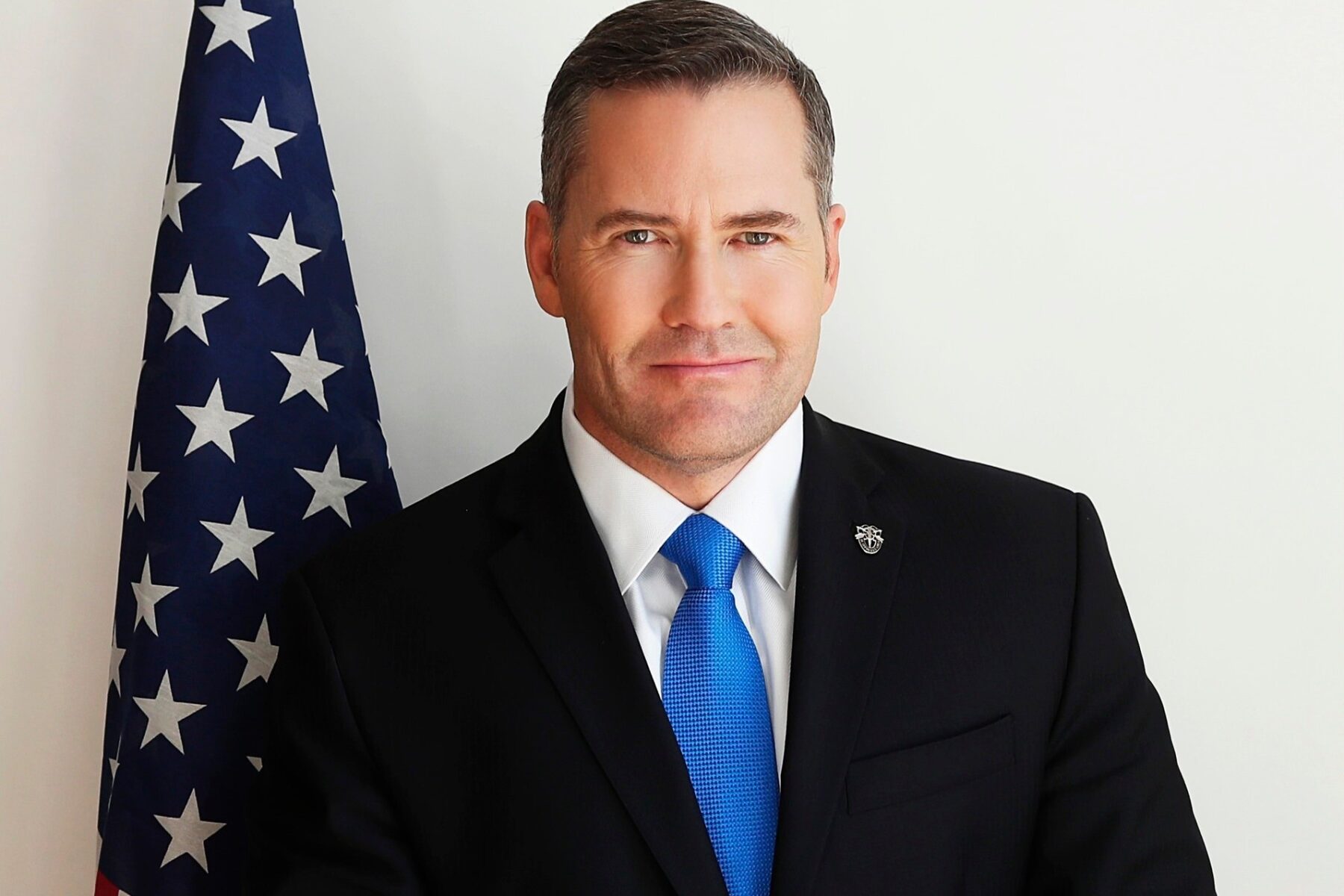 Mike Waltz, US ambassador to the United Nations, in front of a US flag