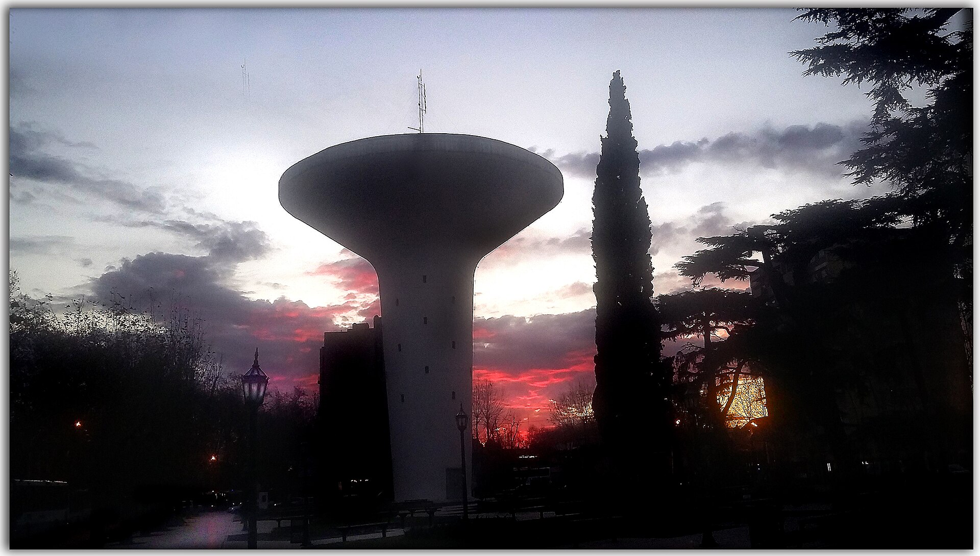 The saucer-shaped water tank on a plaza in Monte Grande, Esteban Echeverría district, Buenos Aires Province, Argentina, at twilight