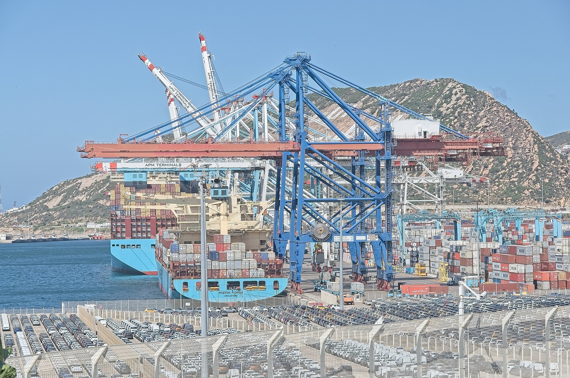Container ship and cranes at the Tanger Med port, Morocco