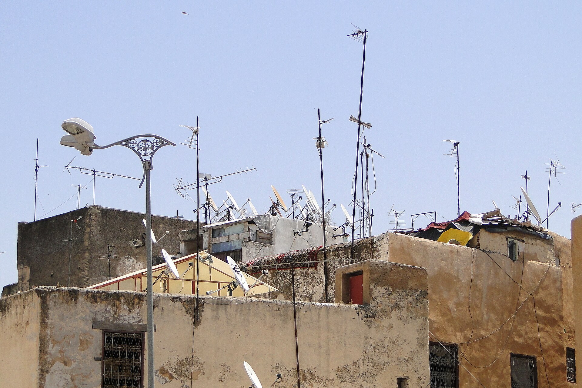 Morocco media reach: aerials and satellite dishes on rooftops in the Fez medina