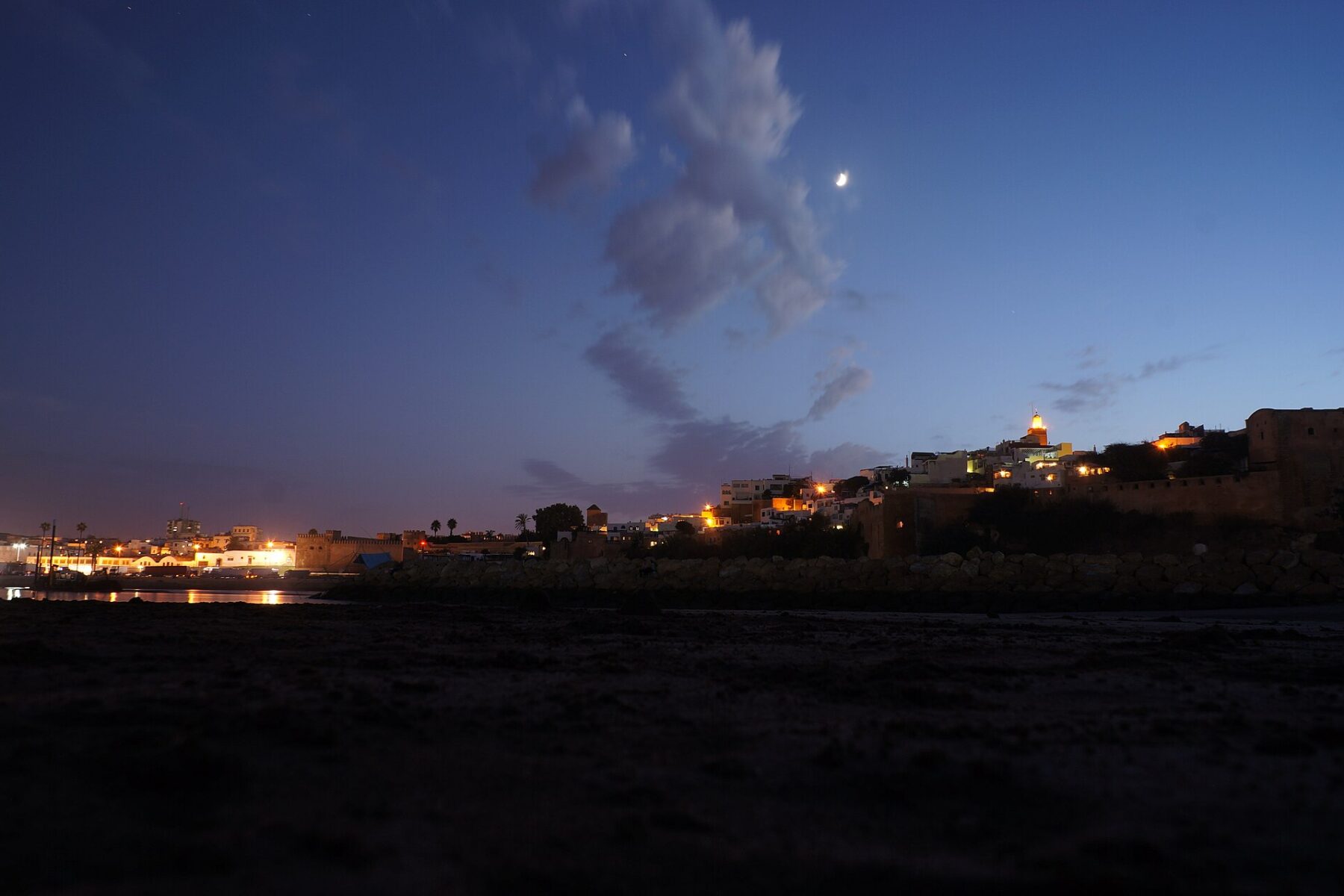The Kasbah of the Udayas in Rabat at dusk, seen across the Bouregreg river
