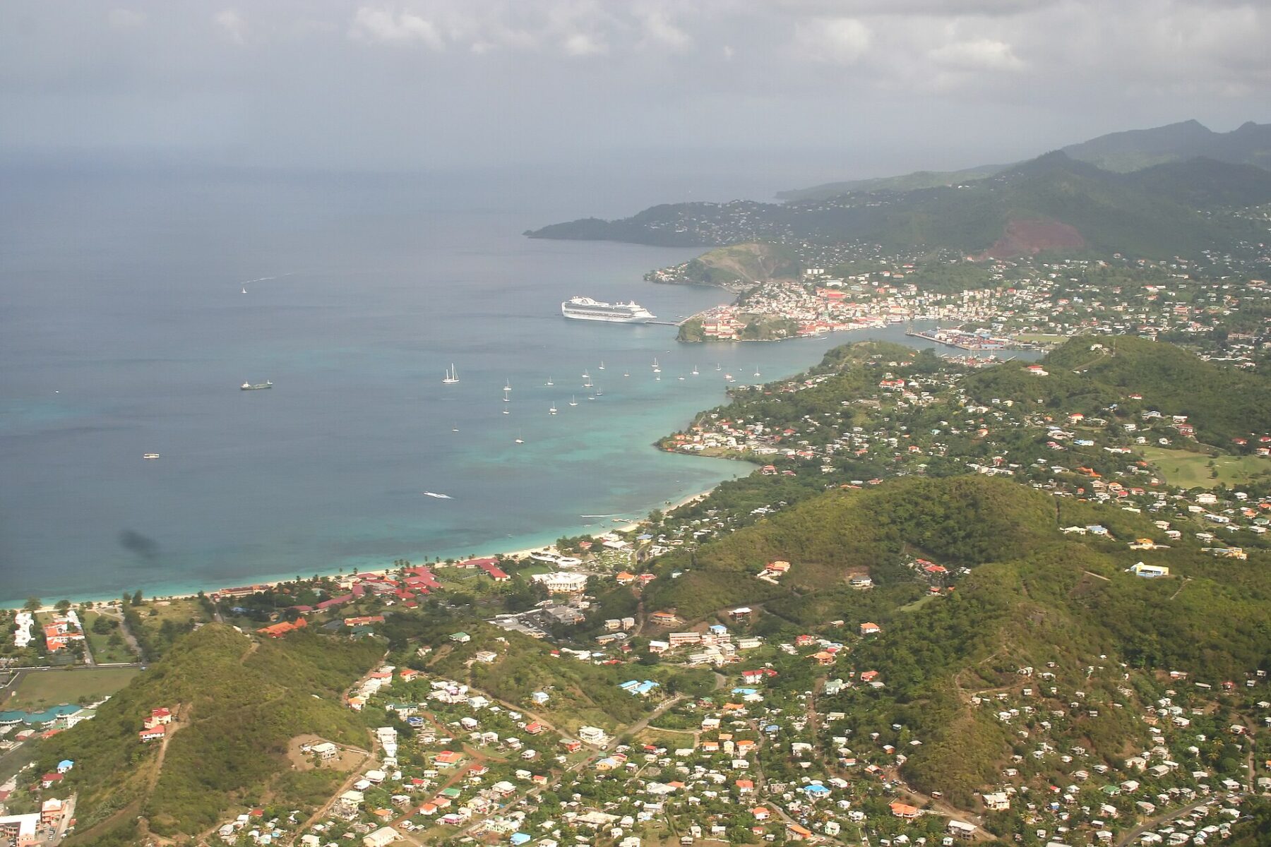 Moving to Grenada: aerial view of Grand Anse, St. George's harbour and hillside homes