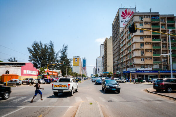 Traffic and apartment blocks on Avenida 25 de Setembro in central Maputo, Mozambique