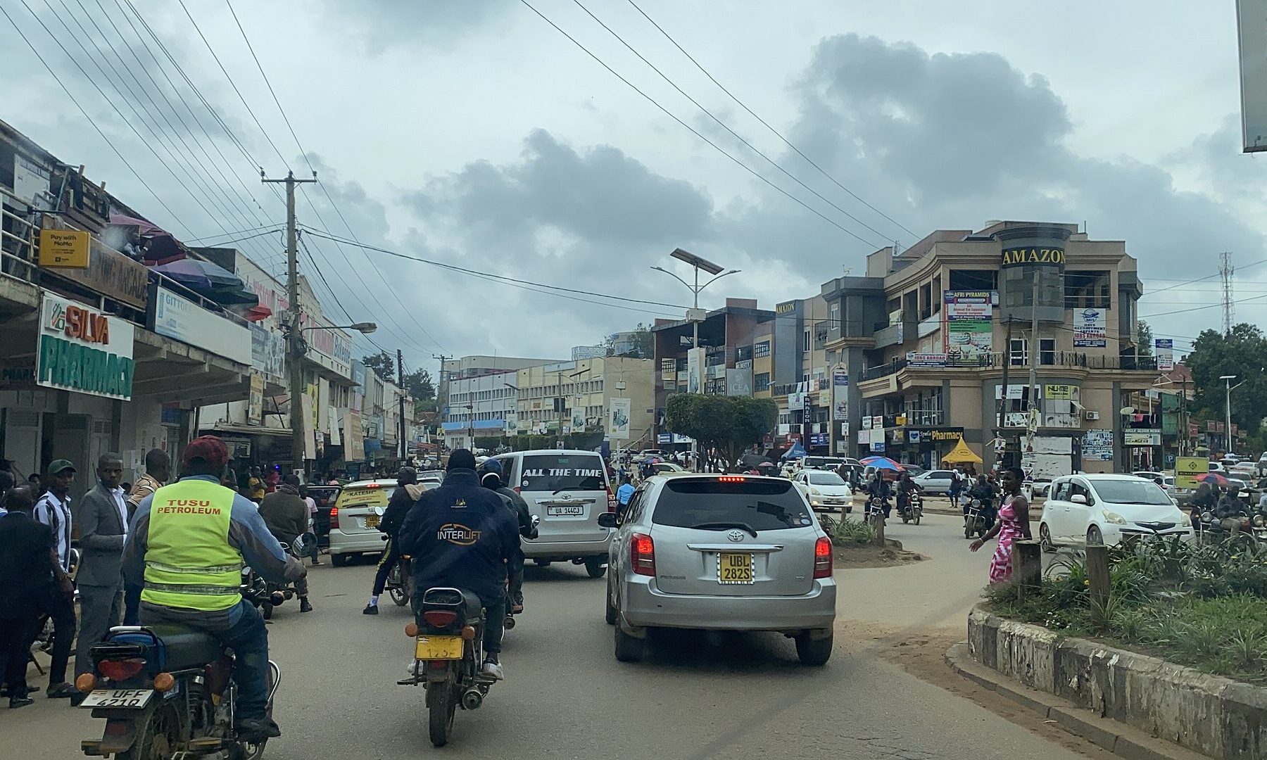 Traffic and motorcycle taxis on High Street in Mbarara, a city in western Uganda