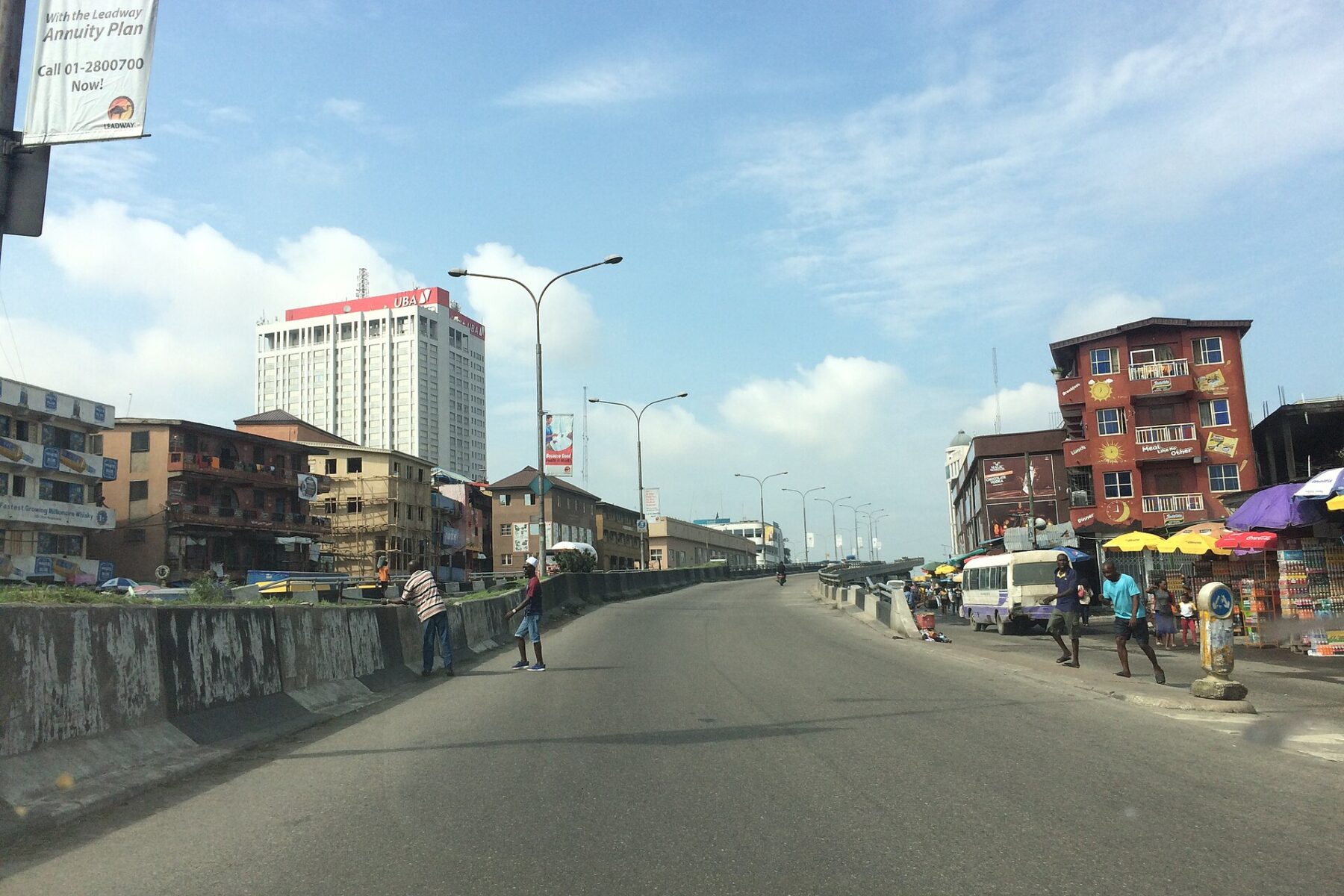 Road on Lagos Island leading towards the UBA House bank tower in Nigeria’s main financial district