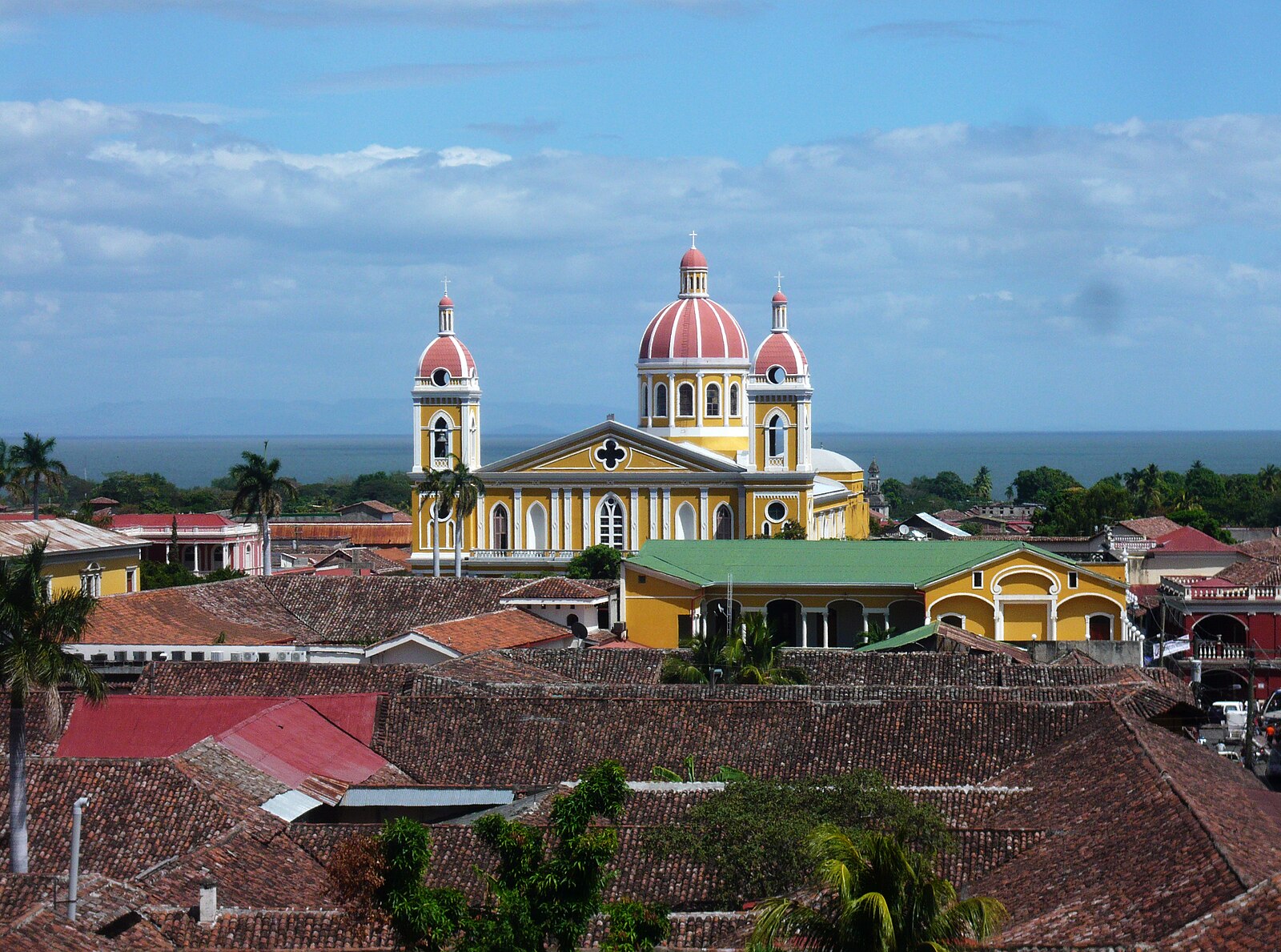 Nicaragua continent: the cathedral of Granada with Lake Nicaragua behind