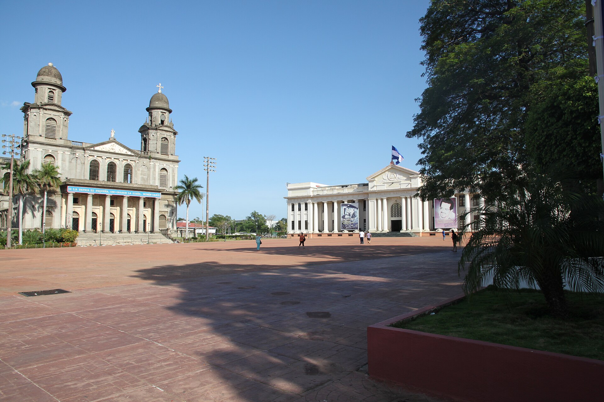 Nicaragua continent politics: Managua plaza with the old cathedral and National Palace