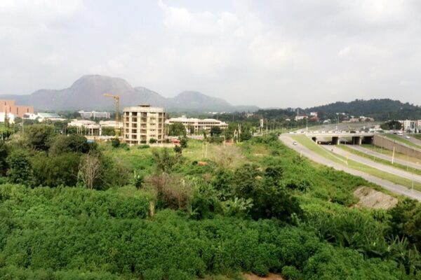 Aso Rock and the central district of Abuja, Nigeria, seen from a roadside viewpoint