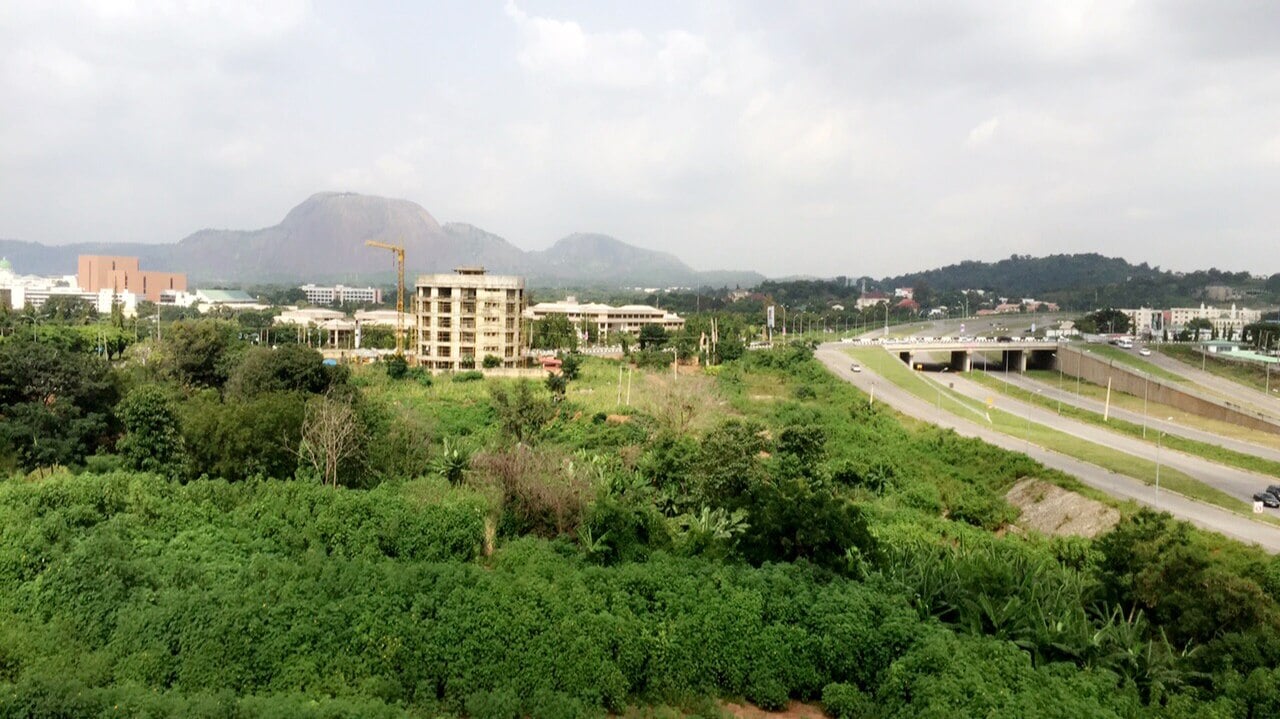 Aso Rock and the central district of Abuja, Nigeria, seen from a roadside viewpoint