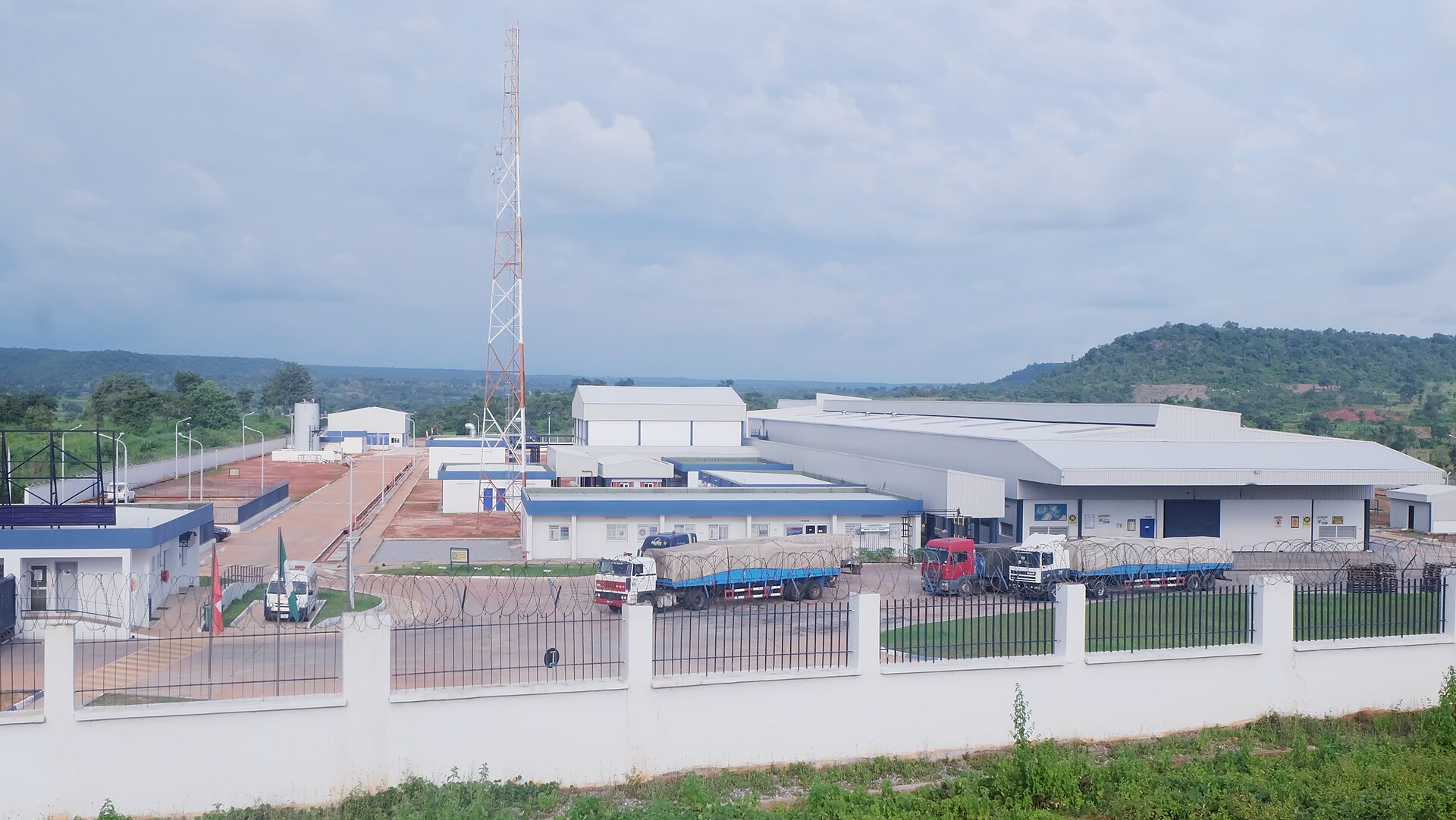 Nestlé water bottling plant in Abaji, Federal Capital Territory, Nigeria, with lorries parked inside the fence