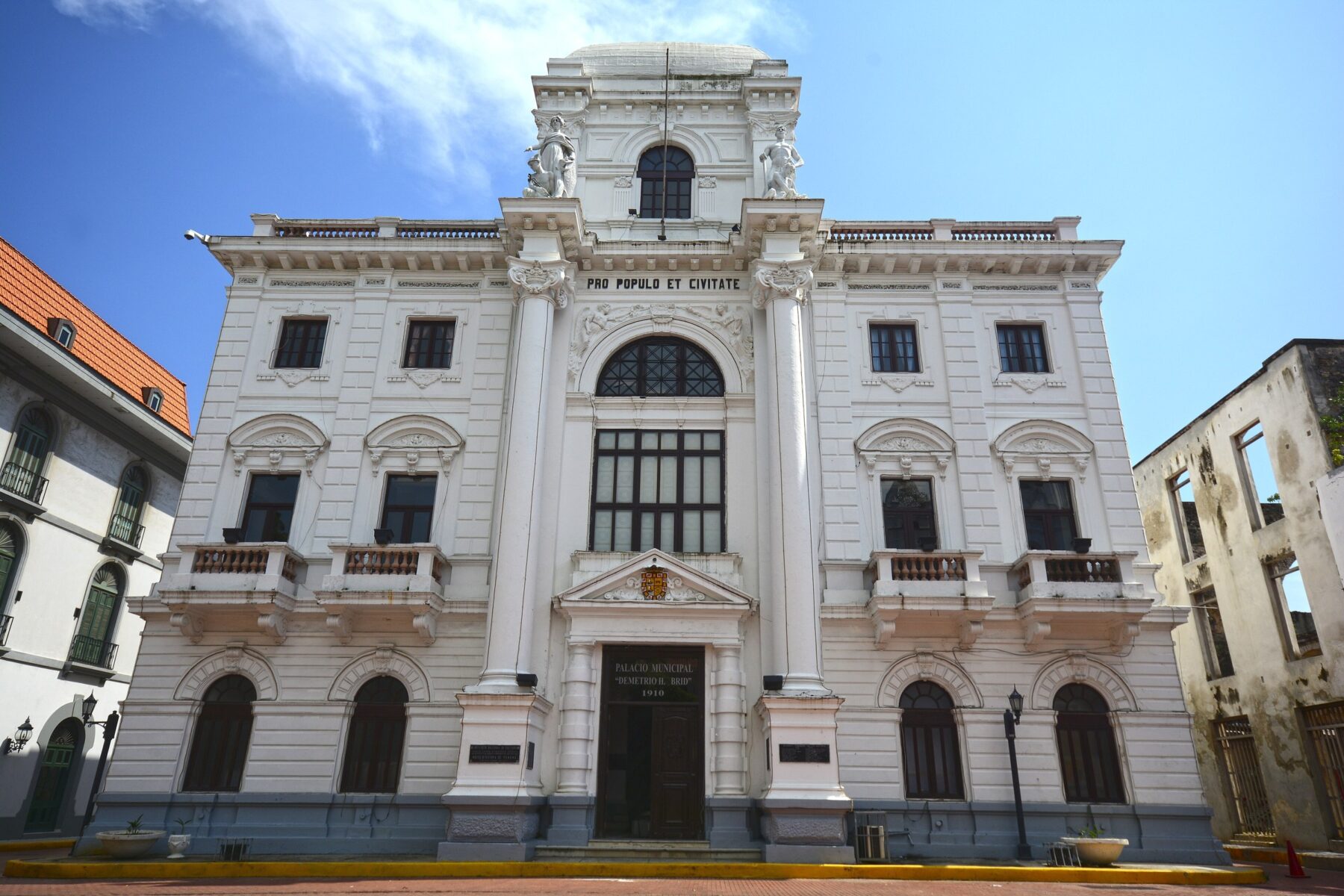 The white 1910 Municipal Palace of Panama City in the old quarter, under a blue sky