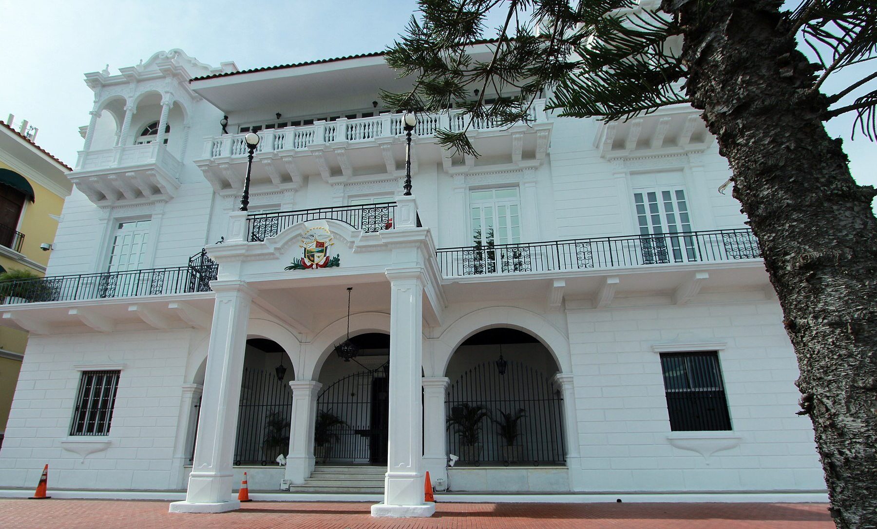 The white Palacio de las Garzas in Panama City, seat of the presidency, with the national coat of arms above its entrance
