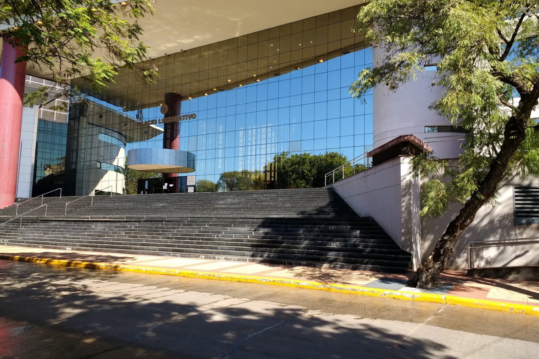 Glass facade and wide stone steps of the Palacio Legislativo, seat of Paraguay's Congress, in Asuncion