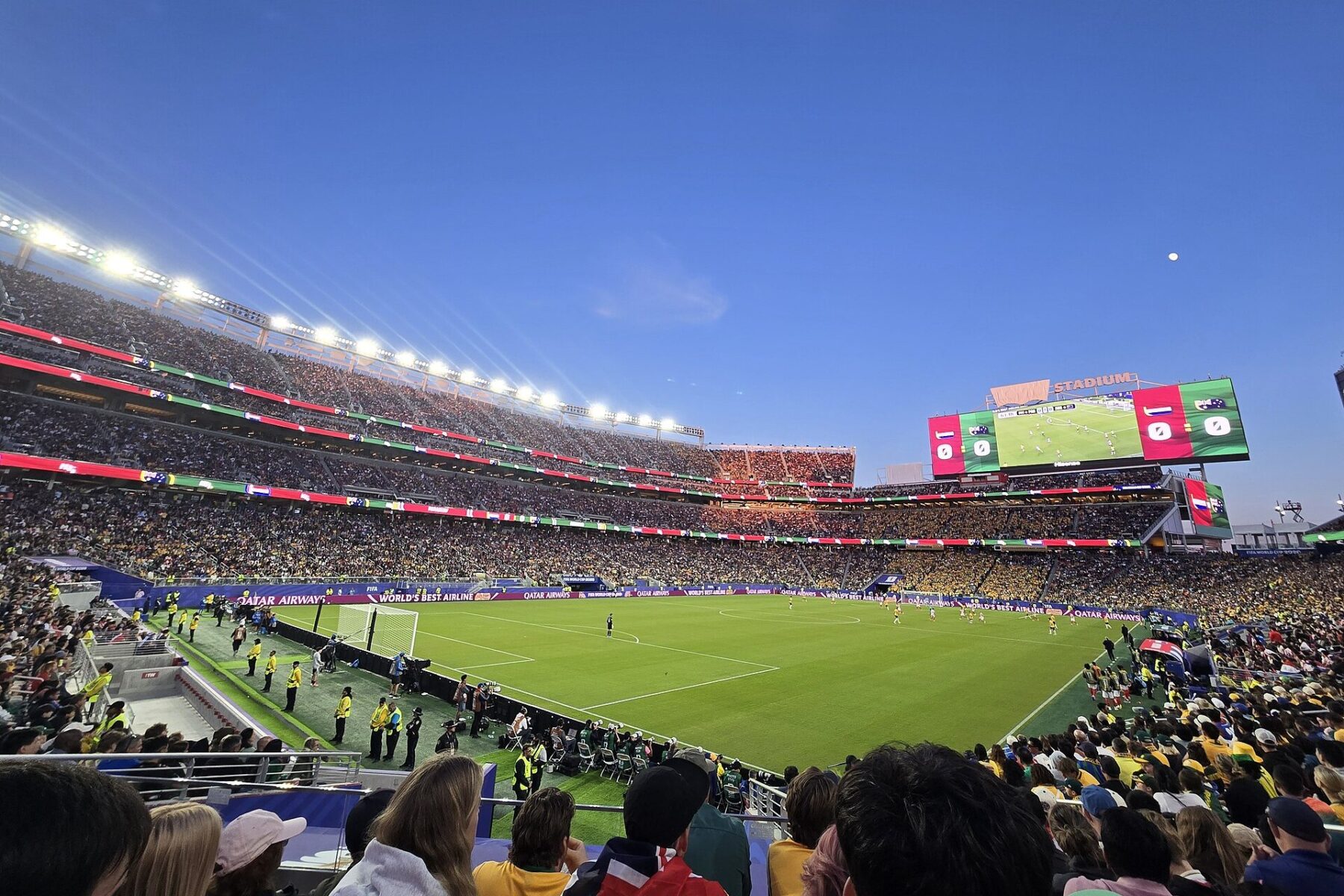 Fans fill Levi's Stadium at dusk for the Paraguay v Australia World Cup match with the scoreboard showing 0-0
