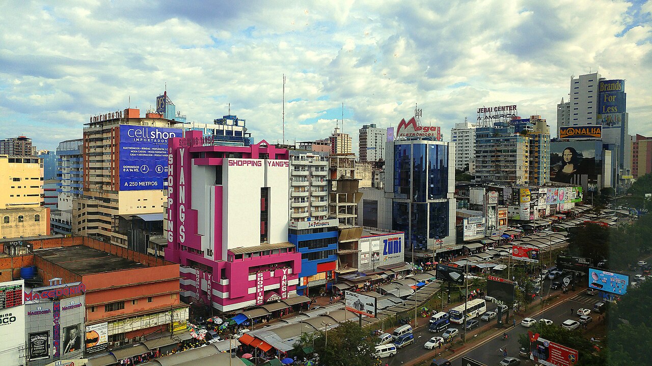 Shopping towers and street markets in downtown Ciudad del Este, Paraguay, on a cloudy day