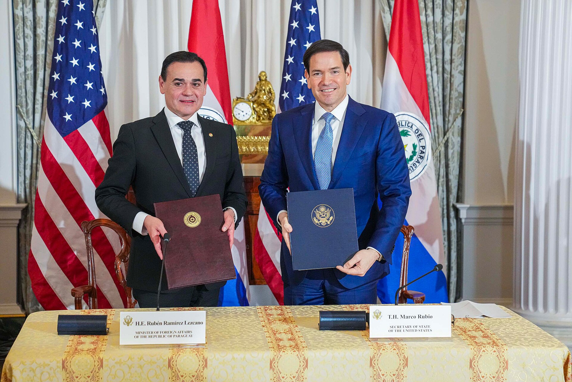 Paraguay's foreign minister Rubén Ramírez Lezcano and US Secretary of State Marco Rubio sign a Status of Forces Agreement in Washington on 15 December 2025
