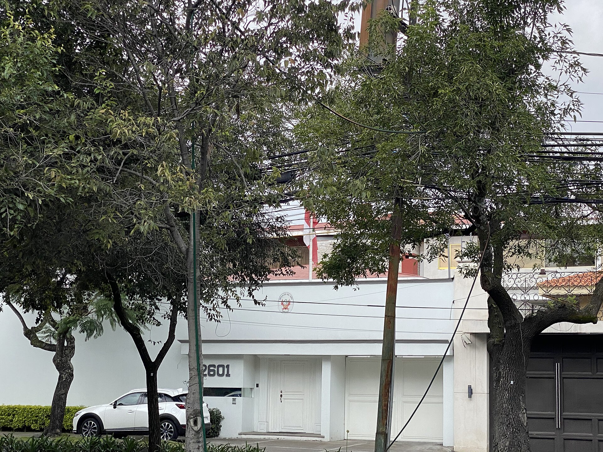 Embassy of Peru in Mexico City behind trees