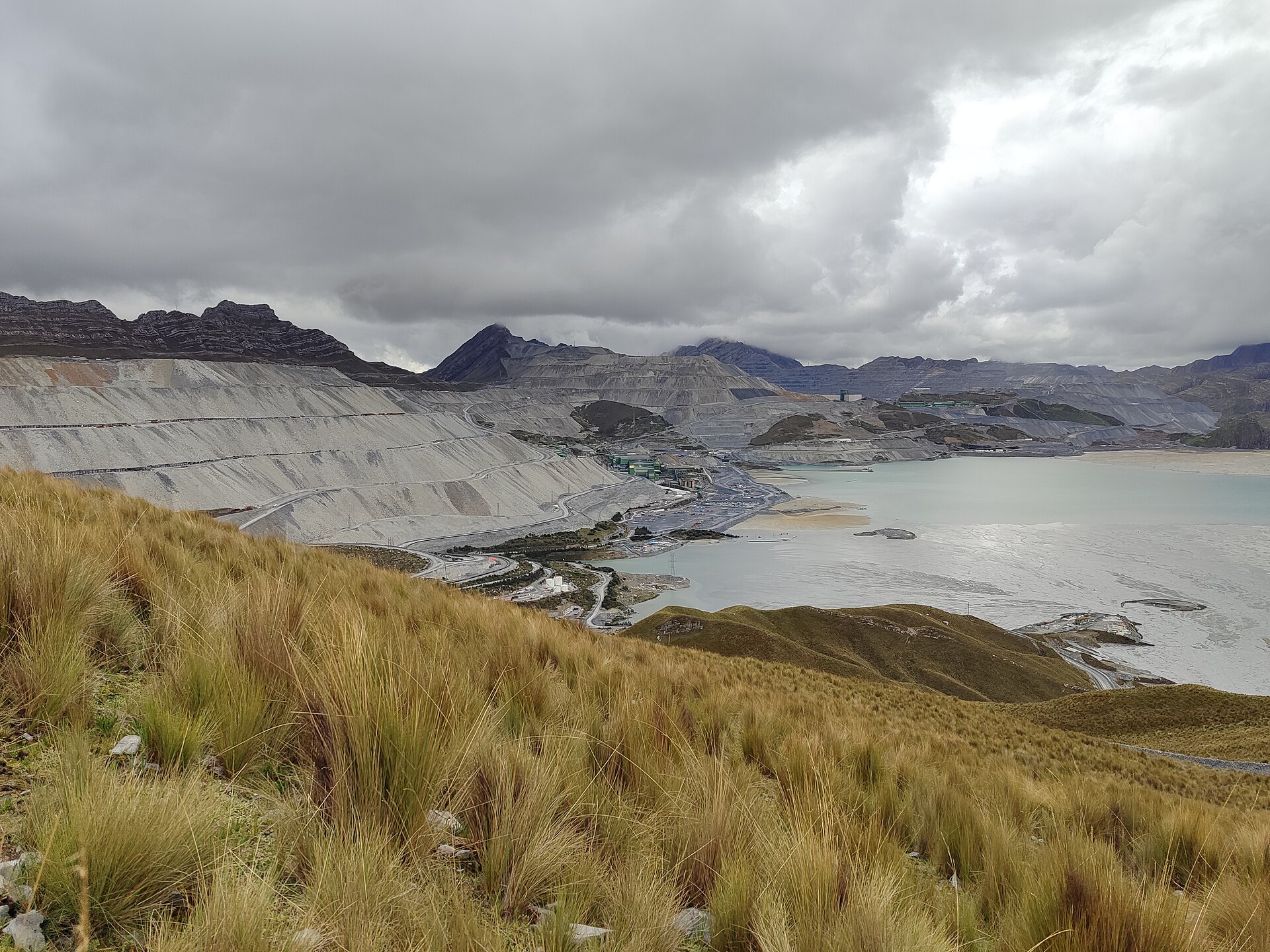 Open pits, waste terraces and tailings lake at the Antamina copper and zinc mine in the Peruvian Andes