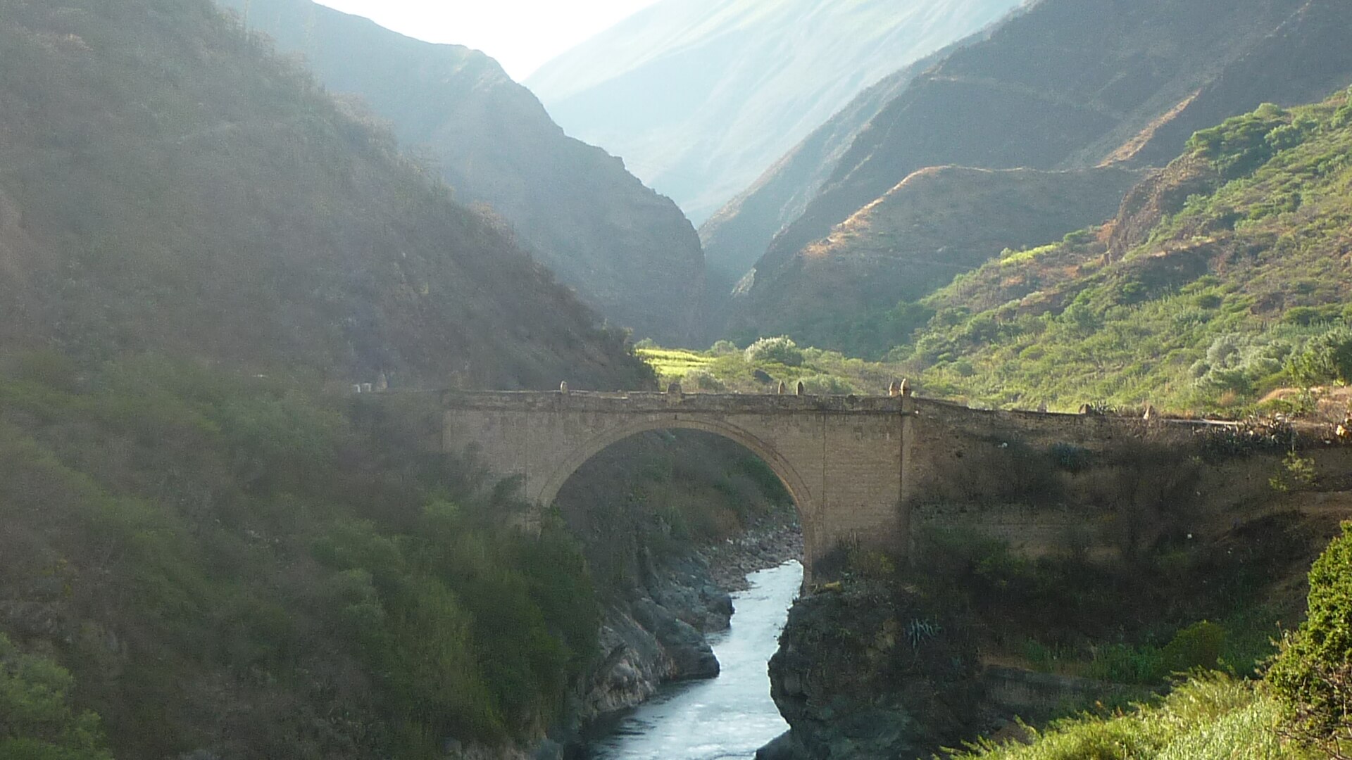 Colonial stone bridge over the Pachachaca River in the Andes of Apurímac, Peru