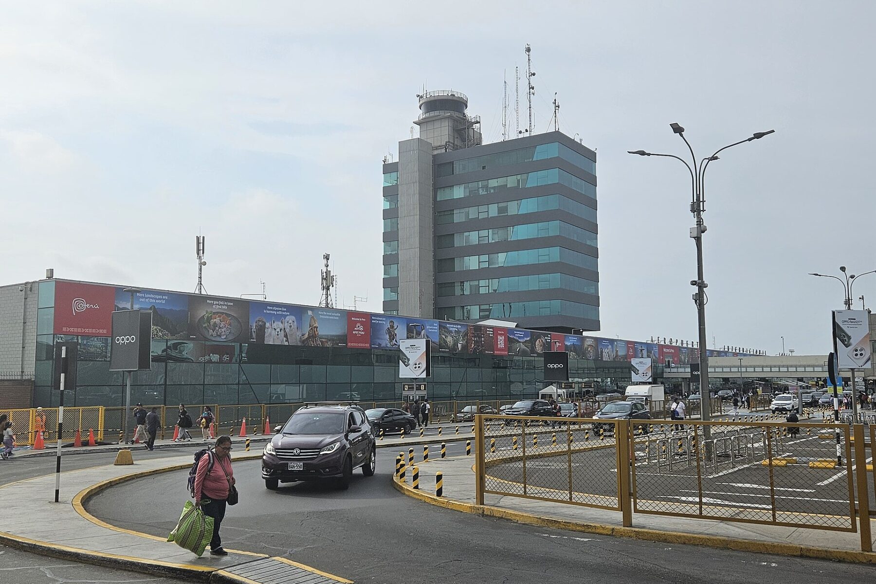 Access road and control tower at Jorge Chávez International Airport in Lima, Peru