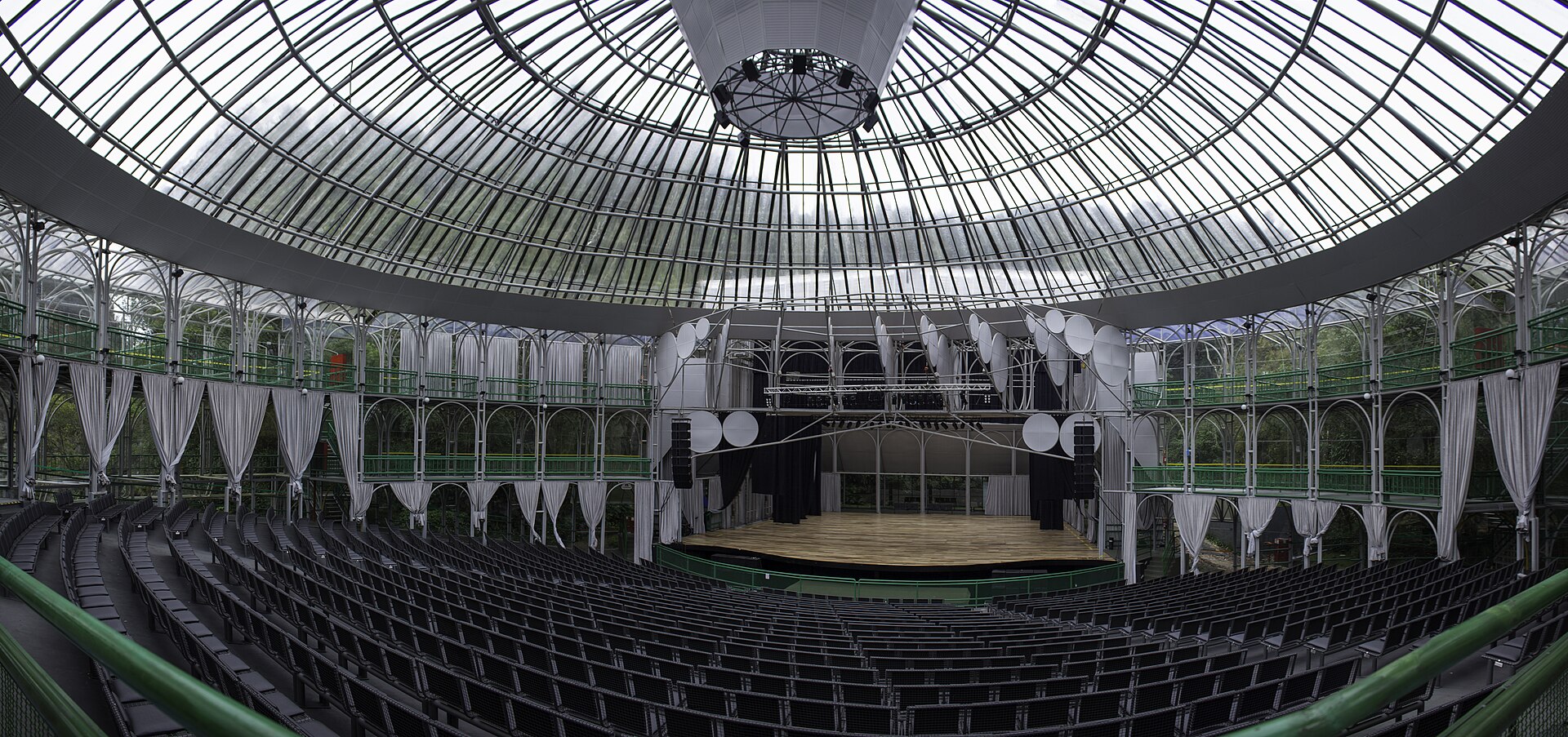 The seating bowl and stage of the Ópera de Arame, Curitiba's glass and steel theatre, under its transparent dome