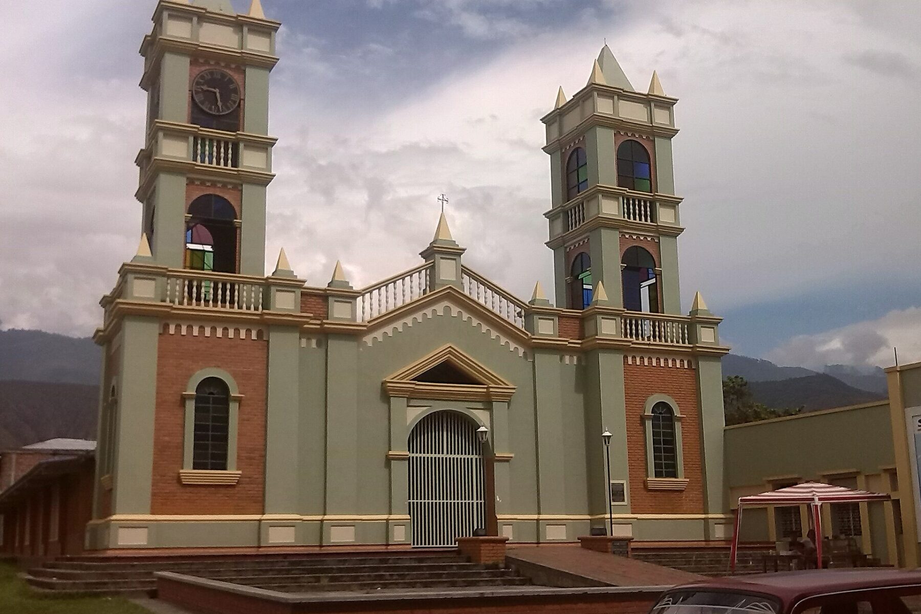 The pale green and brick church of Miranda, Cauca, Colombia, with two bell towers (file photo)