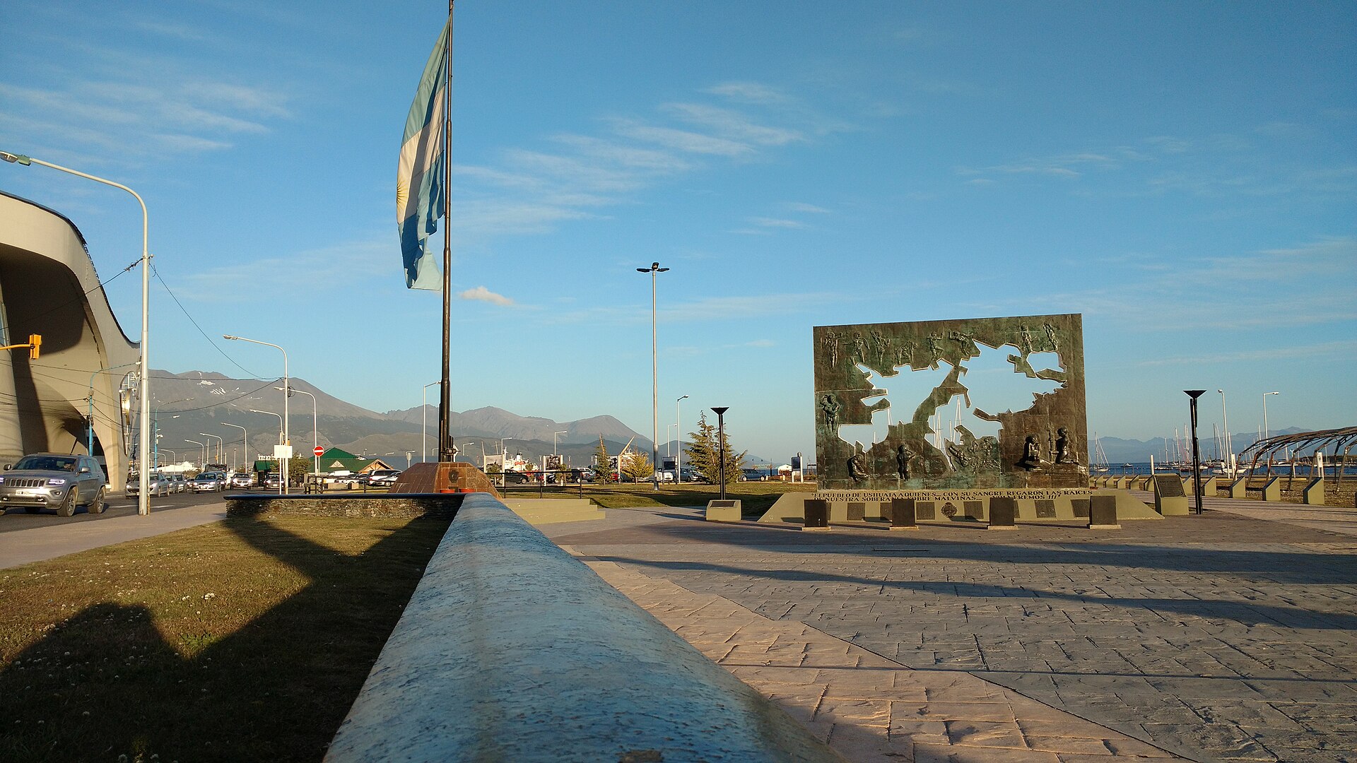 Monument with a map of the Malvinas Islands and an Argentine flag at Plaza Islas Malvinas in Ushuaia