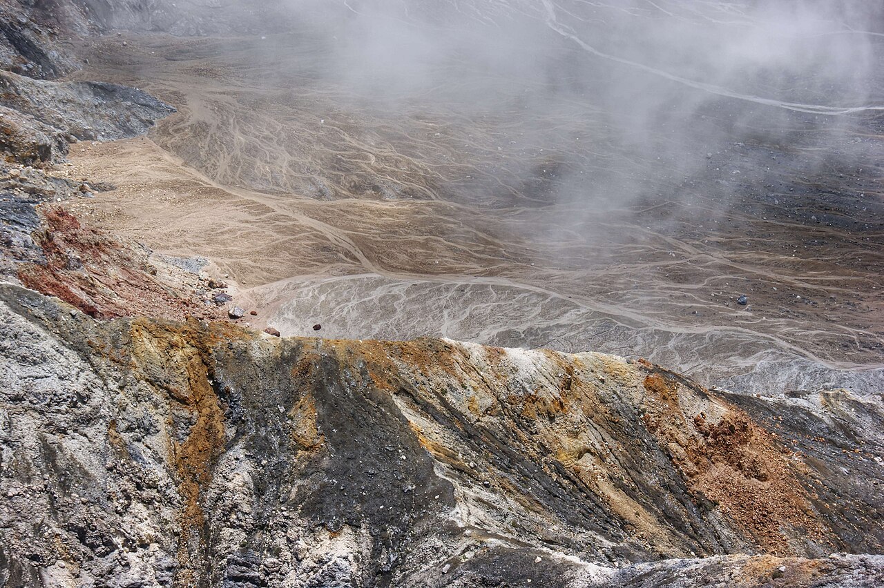 Steam over the rim and floor of the Poás Volcano crater in Costa Rica.