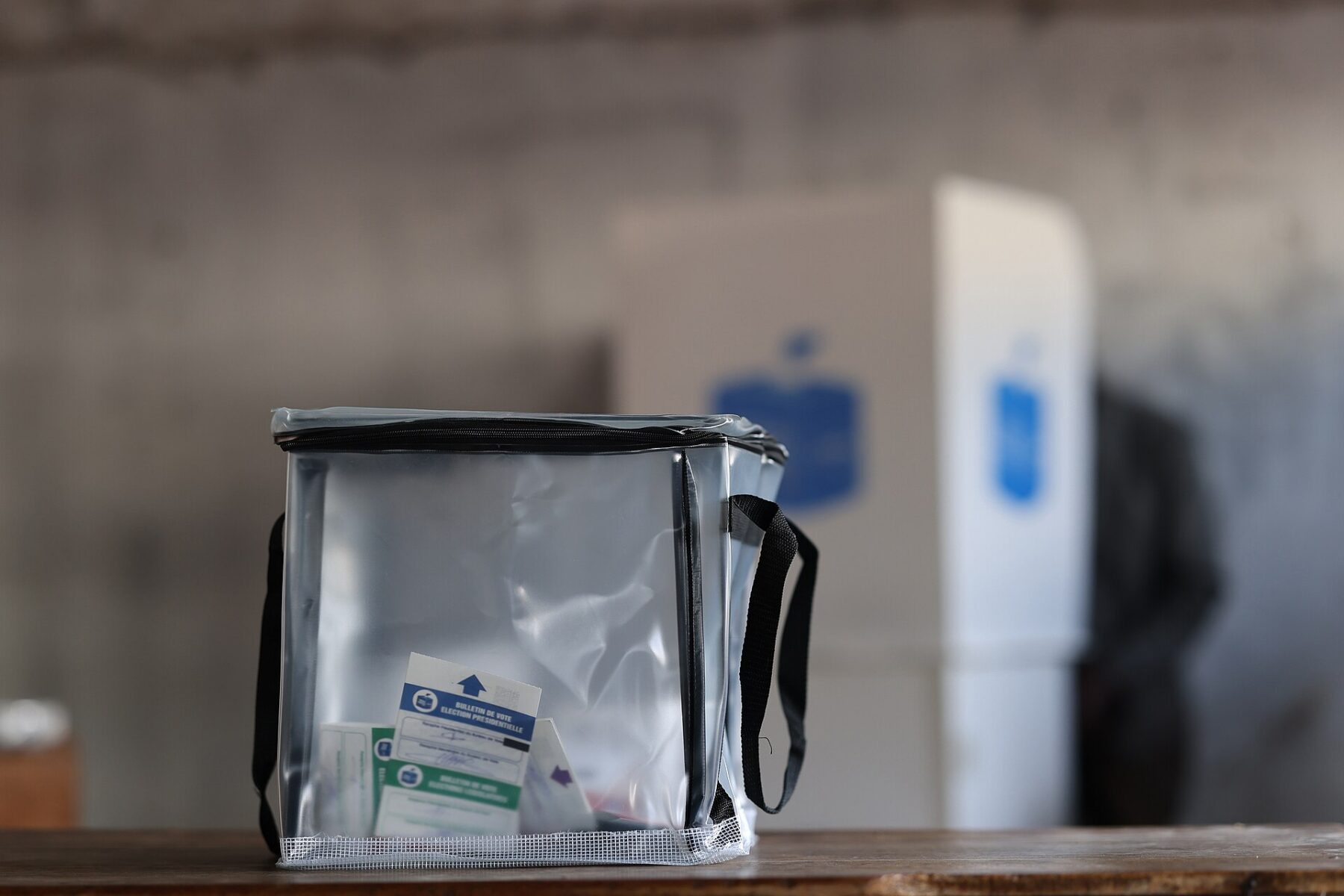 A transparent ballot box holding presidential and legislative ballot papers at a vote centre in Goma, North Kivu