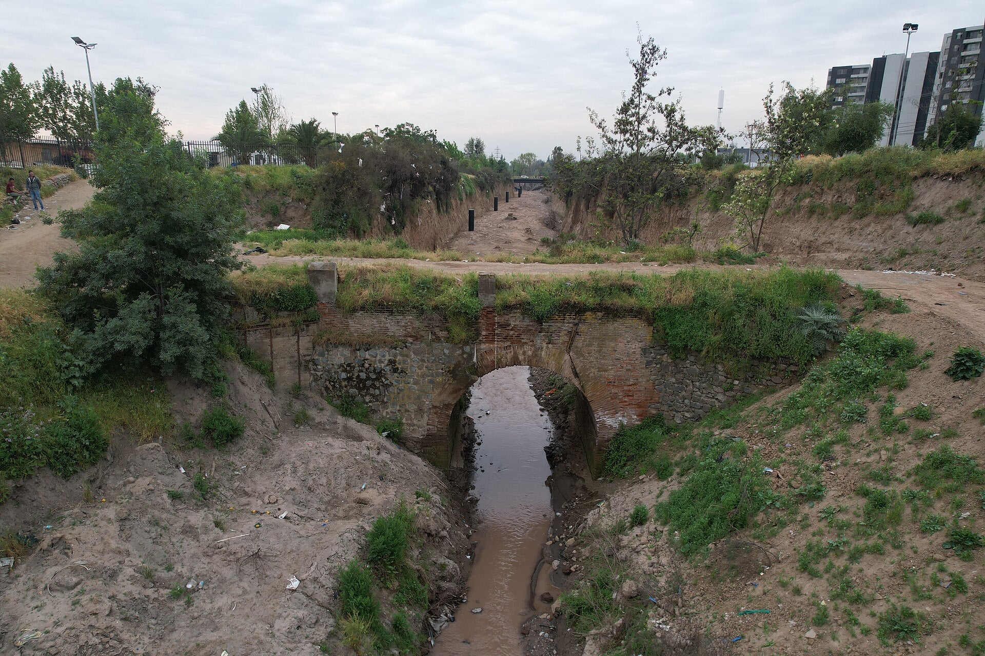Colonial brick and stone bridge over the Canal San Carlos in Puente Alto, Chile