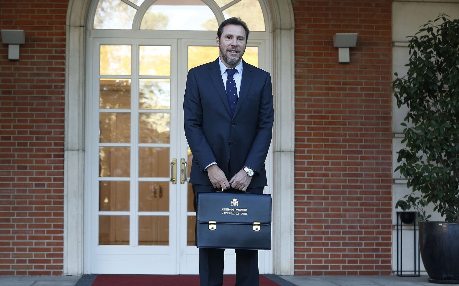 Óscar Puente, Spain's Transport Minister, holding his ministerial briefcase