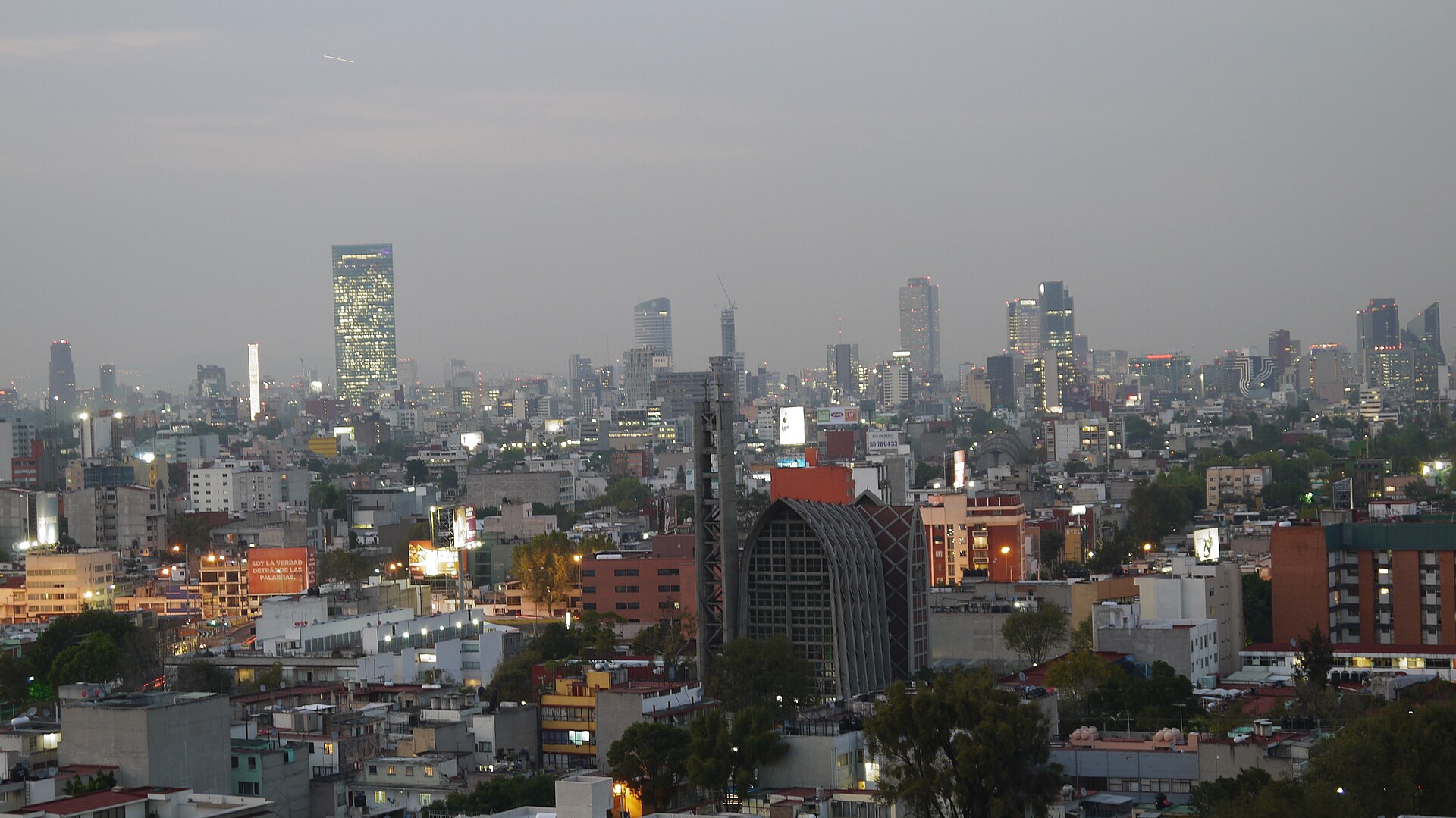 Mexico City skyline with office towers at dusk