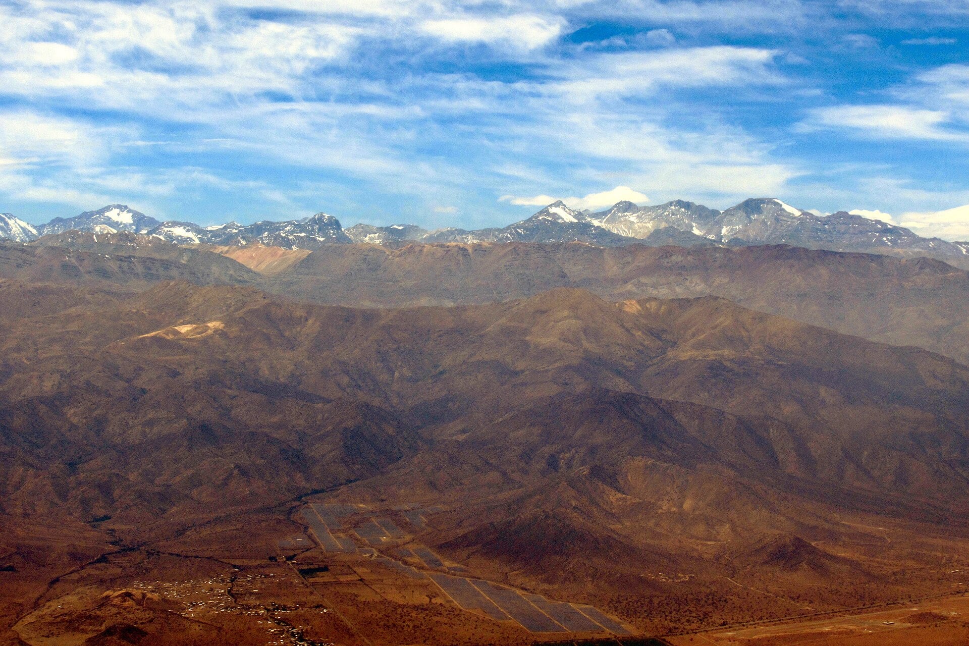 Aerial view of a large solar plant in the foothills of the Andes near Santiago, Chile