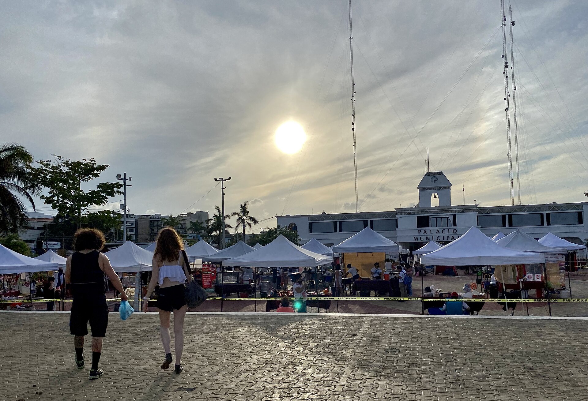 Market stalls in front of the Palacio Municipal in Playa del Carmen, Quintana Roo, at sunset