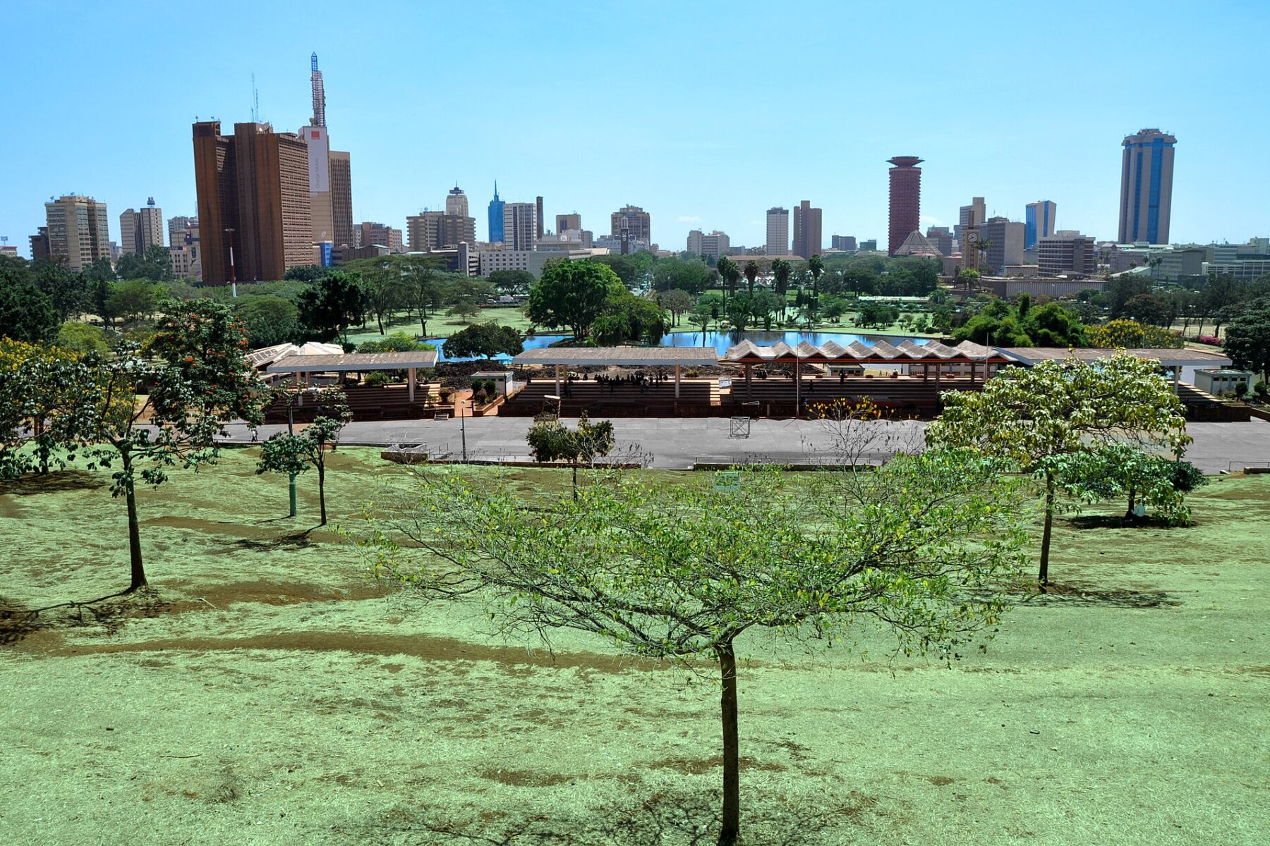 Nairobi city skyline seen from Uhuru Park under a clear blue sky