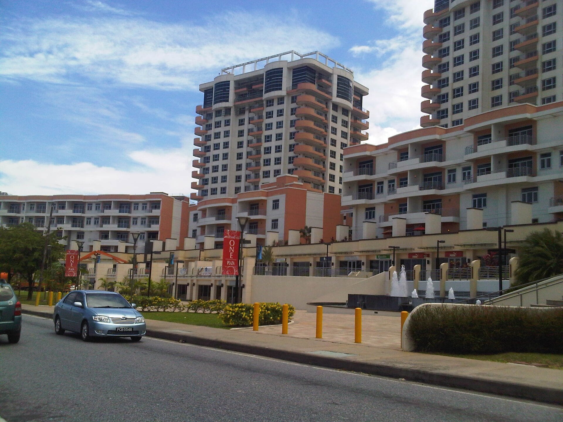 Apartment towers and a plaza at One Woodbrook Place in Port of Spain, Trinidad and Tobago
