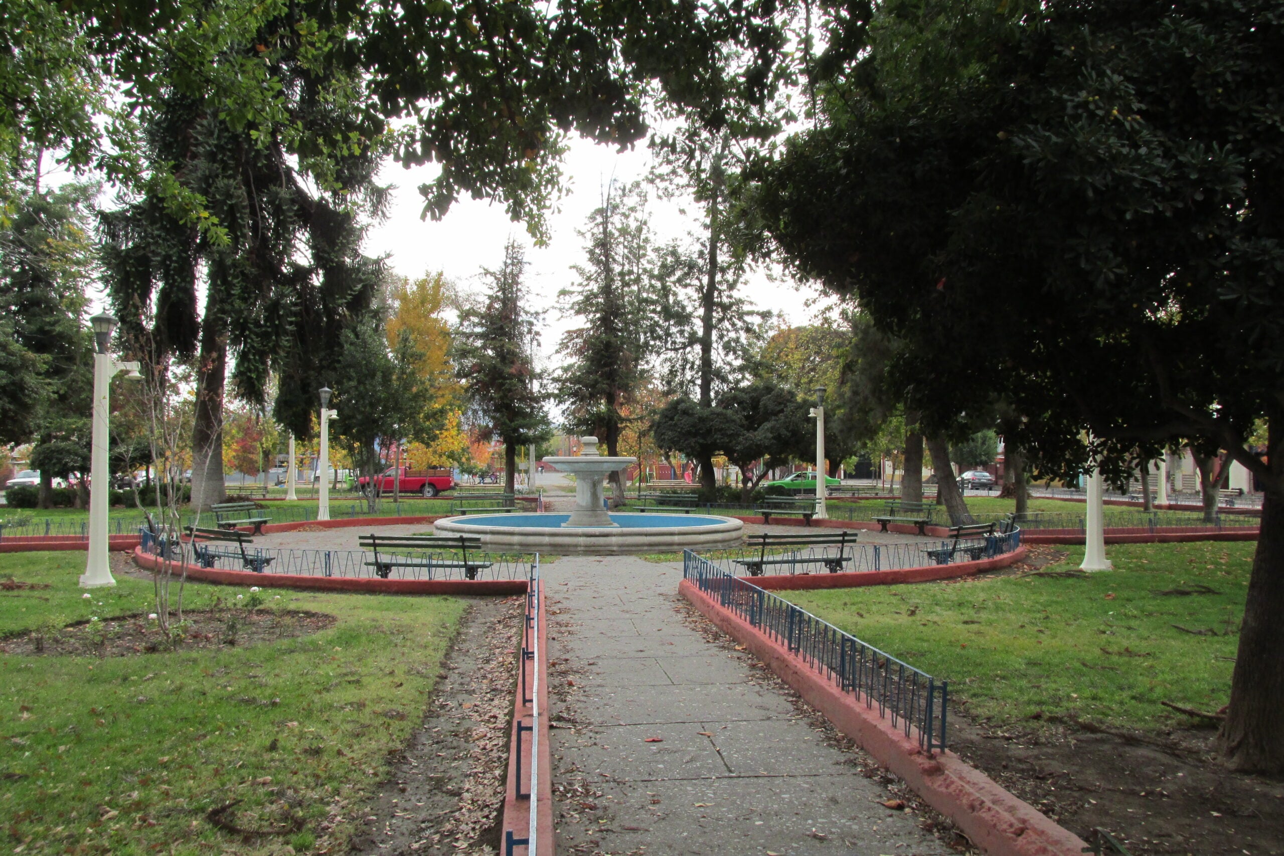 Fountain and benches in the main square of Requínoa, Chile