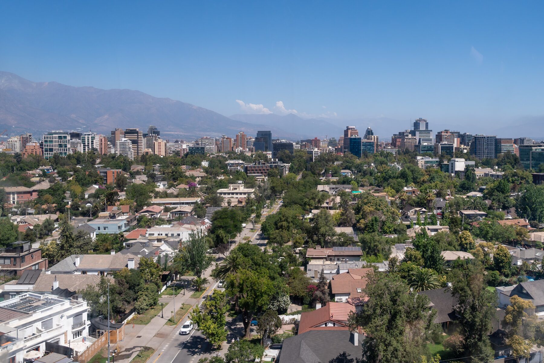 Rooftops and office towers of Santiago, Chile, with the Andes behind